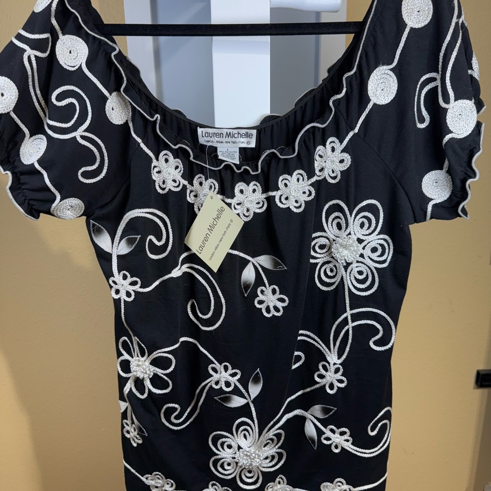 Lauren Michelle Black and White Ruffled Blouse